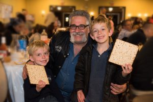 family with matzah at Oorah