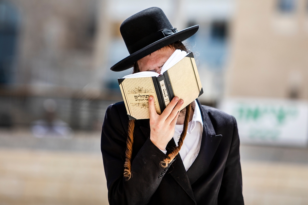 Jewish man praying, perhaps for healing the sick