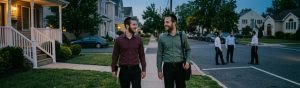 Two friends walking, demonstrating how a thoughtful Jewish greeting brings blessings upon he who gives it.