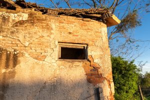 crumbling house - a symbol of tzara'at, the punishment for lashon hara - evil speech