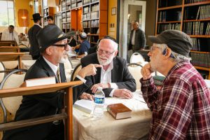 Talmudic Debate amongst TorahMates at the Men's Retreat at TheZone