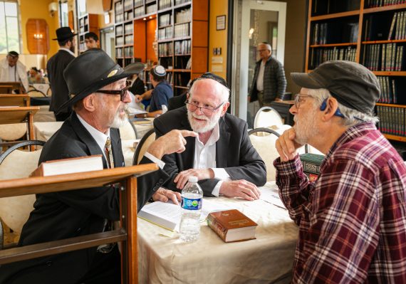 Talmudic Debate amongst TorahMates at the Men's Retreat at TheZone