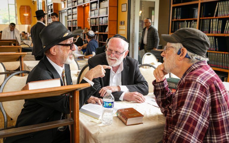 Talmudic Debate amongst TorahMates at the Men's Retreat at TheZone