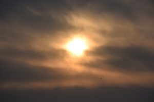The Jewish view of suicide and the spiritual value of life represented by light breaking through dark storm clouds.