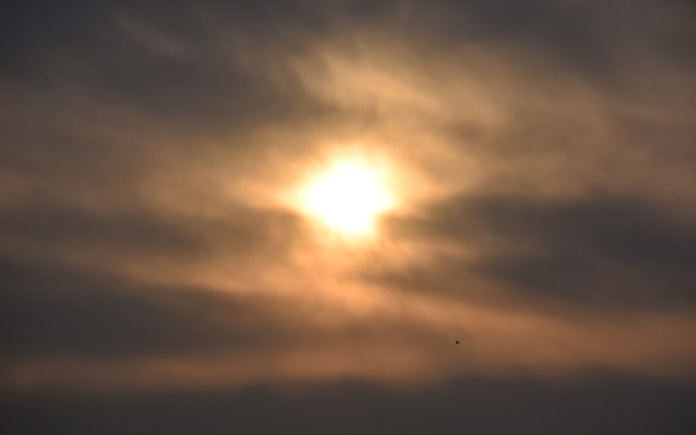 The Jewish view of suicide and the spiritual value of life represented by light breaking through dark storm clouds.